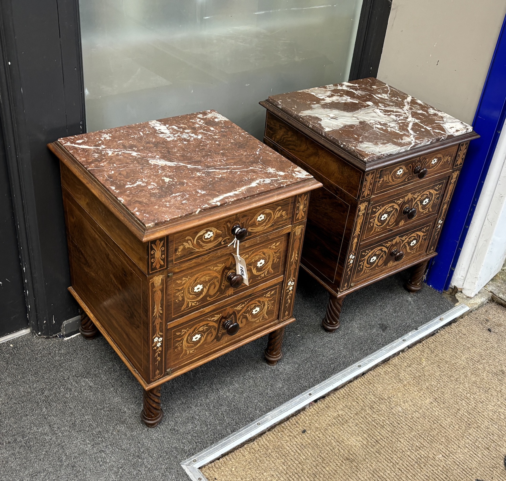 A pair of late 19th century French marquetry inlaid rosewood three drawer marble topped bedside chests, width 39cm, depth 38cm, height 53cm